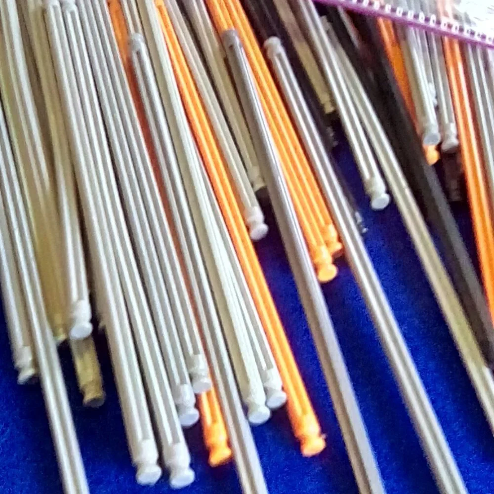 K'NEX 190 mm rods, grey, black, orange.